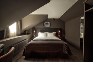 The Lamp Hotel & Spa客房内的一张或多张床位