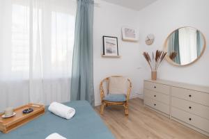 Posteľ alebo postele v izbe v ubytovaní Marina Corner Apartment Gdynia by Noclegi Renters