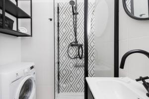 Kúpeľňa v ubytovaní Marina Corner Apartment Gdynia by Noclegi Renters
