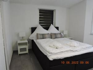 Een bed of bedden in een kamer bij Feldmann Haus