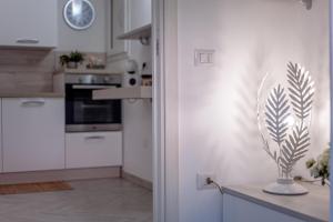Kuchyňa alebo kuchynka v ubytovaní Casa Petunia