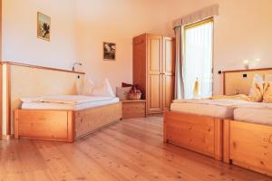 Postel nebo postele na pokoji v ubytování Agritur Bella di Bosco