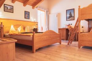 Postel nebo postele na pokoji v ubytování Agritur Bella di Bosco