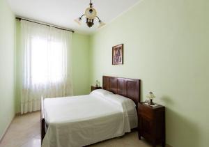מיטה או מיטות בחדר ב-Casa De Sanctis - Irpinia