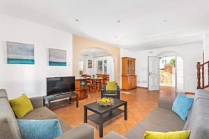 A television and/or entertainment centre at Villa Genestar by Villa Plus