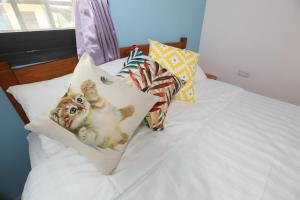 Postel nebo postele na pokoji v ubytování 小葉園民宿Little Ya B&B
