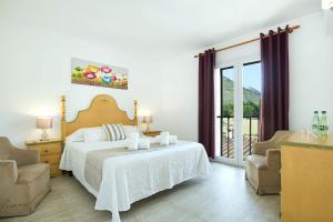 Postel nebo postele na pokoji v ubytování Villa Illa Petita by Villa Plus + 24 fotografií