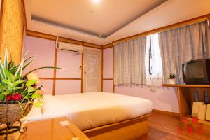 TV a/nebo společenská místnost v ubytování Jenq Yang Hotspring Hotel