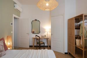 Posteľ alebo postele v izbe v ubytovaní Ensemble rooms di Vayadù