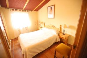 Postel nebo postele na pokoji v ubytování Casas Rurales El Cobijo de Sierra Cazorla