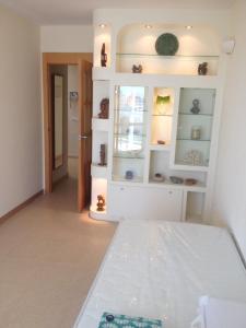 Postel nebo postele na pokoji v ubytování MAGNIFICO ATICO-DUPLEX FRENTE AL MAR