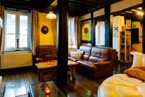 Posezení v ubytování Relax à Maison Sax Kingsize