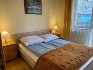 Posteľ alebo postele v izbe v ubytovaní Siklawa