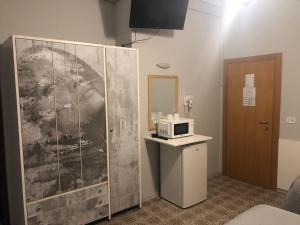Kuchyň nebo kuchyňský kout v ubytování Hotel Wega