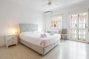 Ένα ή περισσότερα κρεβάτια σε δωμάτιο στο Delighful house next to the beach by Renthas