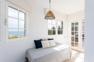 Postel nebo postele na pokoji v ubytování Casa Geneviève Costa del Sol + 37 fotografií