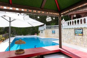 Bazén v ubytování Casa Geneviève Costa del Sol nebo v jeho okolí