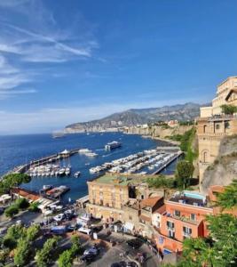 a view of a harbor with boats in the water at A Sorrento in Sorrento