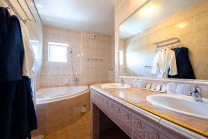 Koupelna v ubytování Spa & Wellness Hotel Orchidea