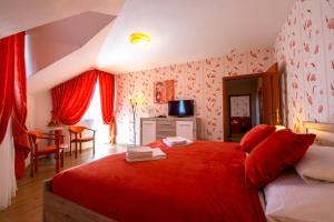 Postel nebo postele na pokoji v ubytování Spa & Wellness Hotel Orchidea
