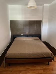 a bedroom with a bed in a room at Giorno&Notte Colleferro in Colleferro +10 photos