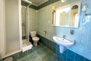 Kúpeľňa v ubytovaní Hotel Uno