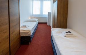 Posteľ alebo postele v izbe v ubytovaní Hotel Uno