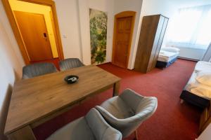 Posteľ alebo postele v izbe v ubytovaní Hotel Uno