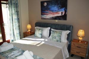 A bed or beds in a room at Best House, Sea View II, Pylos Messinias