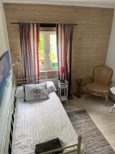 Katil atau katil-katil dalam bilik di Kolmårdsgården B&B