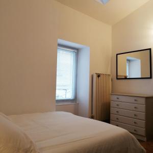 Postel nebo postele na pokoji v ubytování UNE MAISON EN VILLE