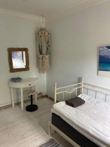 Katil atau katil-katil dalam bilik di Kolmårdsgården B&B