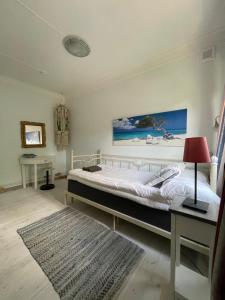 Katil atau katil-katil dalam bilik di Kolmårdsgården B&B