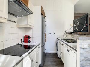 Kuchyň nebo kuchyňský kout v ubytování 2 Bedroom luxury flat Cannes Center La Croisette