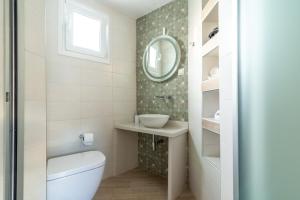 A bathroom at Eleni Luxury Maisonette with Jacuzzi