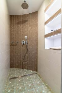 A bathroom at Eleni Luxury Maisonette with Jacuzzi