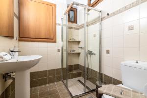 A bathroom at Eleni Luxury Maisonette with Jacuzzi
