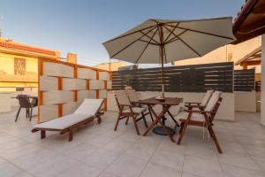 A balcony or terrace at Eleni Luxury Maisonette with Jacuzzi