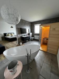 Postel nebo postele na pokoji v ubytování B&B RingLodge