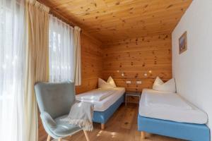 Postel nebo postele na pokoji v ubytování SR Apartments GmbH Rabitschhof