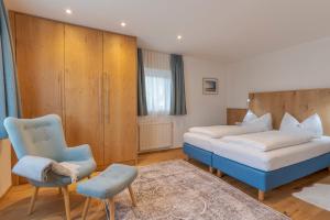 Postel nebo postele na pokoji v ubytování SR Apartments GmbH Rabitschhof