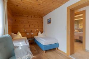 Postel nebo postele na pokoji v ubytování SR Apartments GmbH Rabitschhof