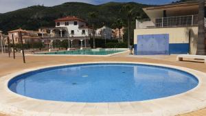 The swimming pool at or close to Herba Sana