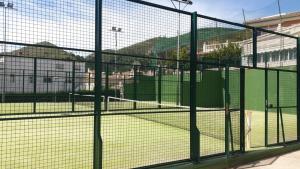 Tennis and/or squash facilities at Herba Sana or nearby