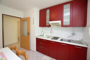 Kuchyň nebo kuchyňský kout v ubytování Apartment Luna