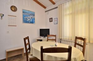 TV a/nebo společenská místnost v ubytování Apartment Luna