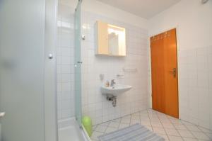 Koupelna v ubytování Apartment Luna + 27 fotografií