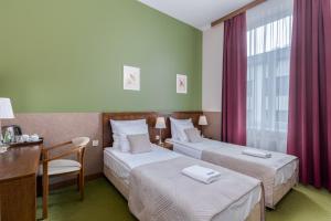 Posteľ alebo postele v izbe v ubytovaní Hotel Yarden by Artery Hotels