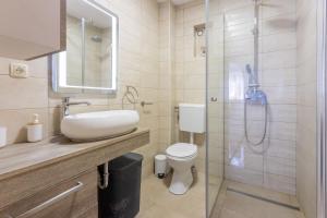 Kúpeľňa v ubytovaní Apartments Natalija