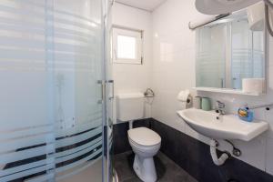 Kúpeľňa v ubytovaní Apartments Natalija